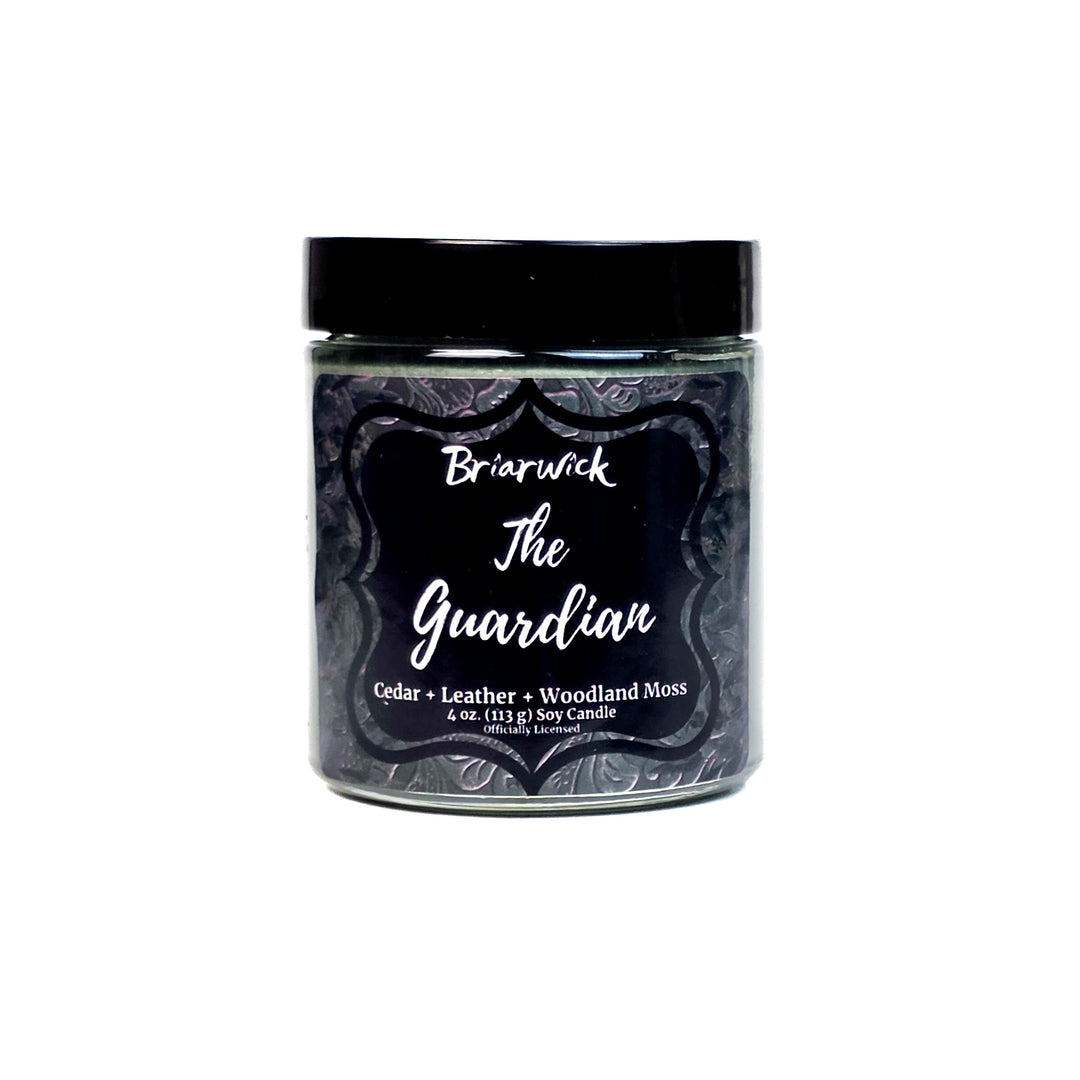 Green candle labeled 'The Guardian' by Briarwick on a white background
