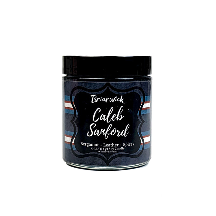 Jar of Caleb Sanford candle with black lid and label on a white background