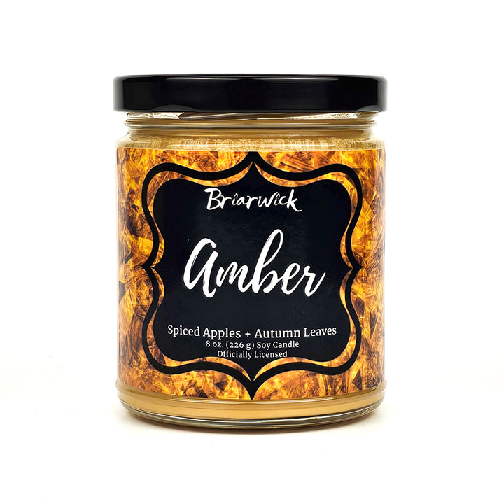 a jar of amber with a black label