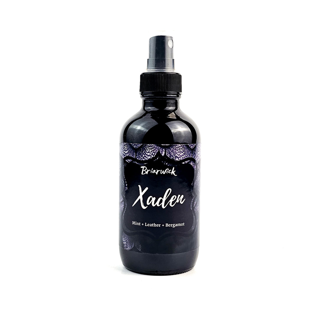 Xaden 4oz Linen Spray with black dragon scale design on a white background