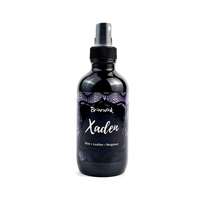 Xaden 4oz Linen Spray with black dragon scale design on a white background