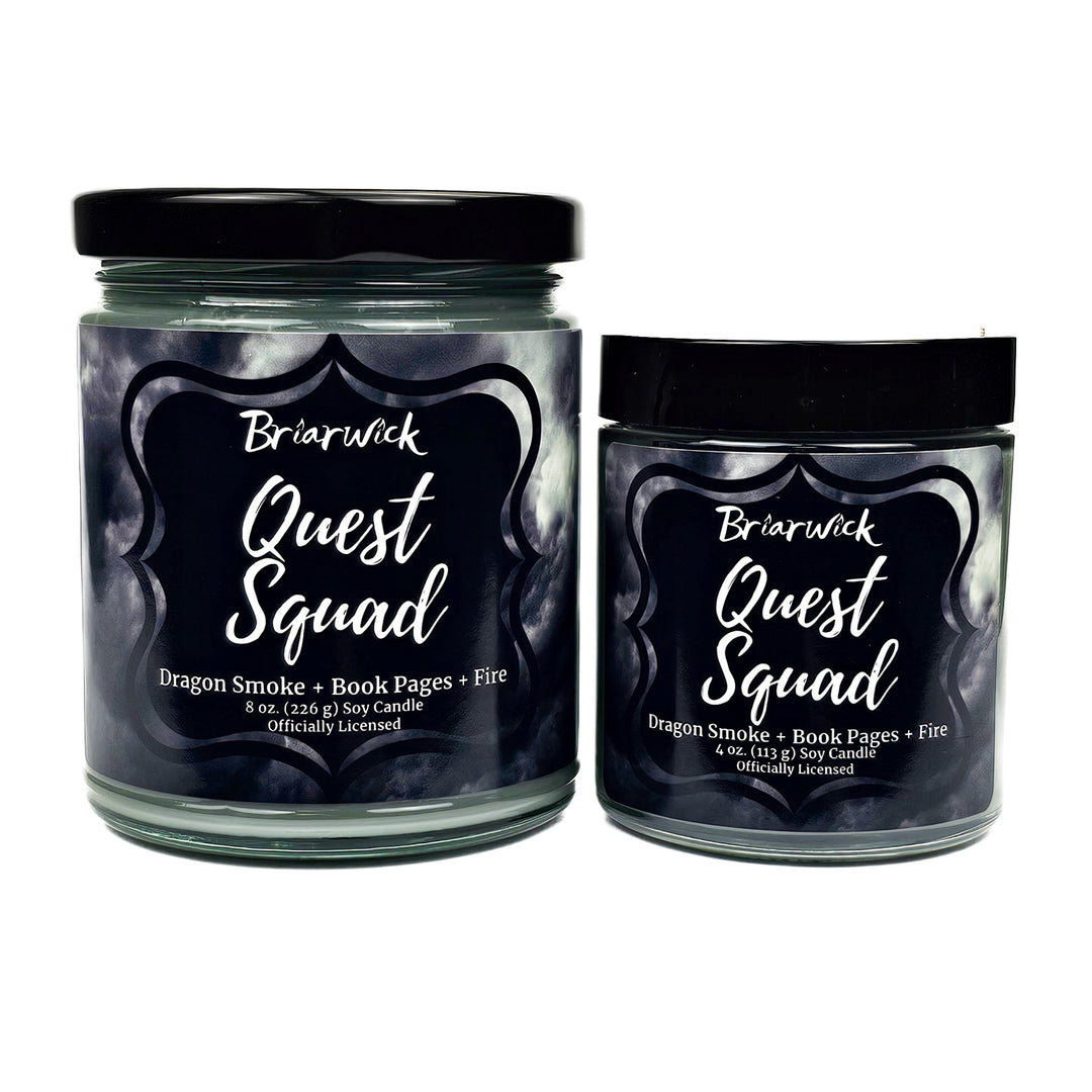 Quest Squad 8oz & 4oz smoke gray candles with gray smoke designs on a white background
