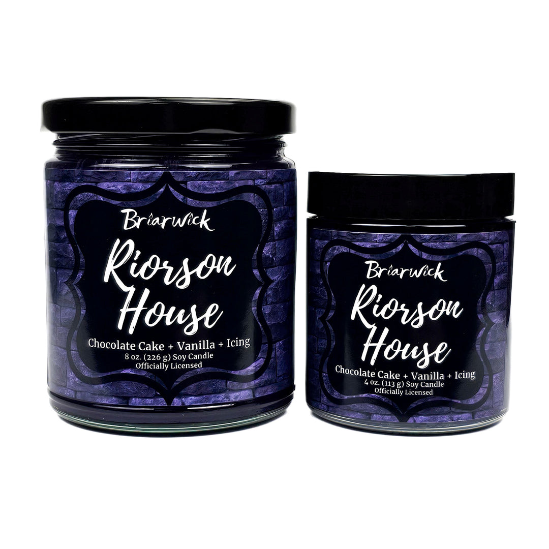Riorson House 8oz & 4oz eggplant candles with purple brick designs on a white background