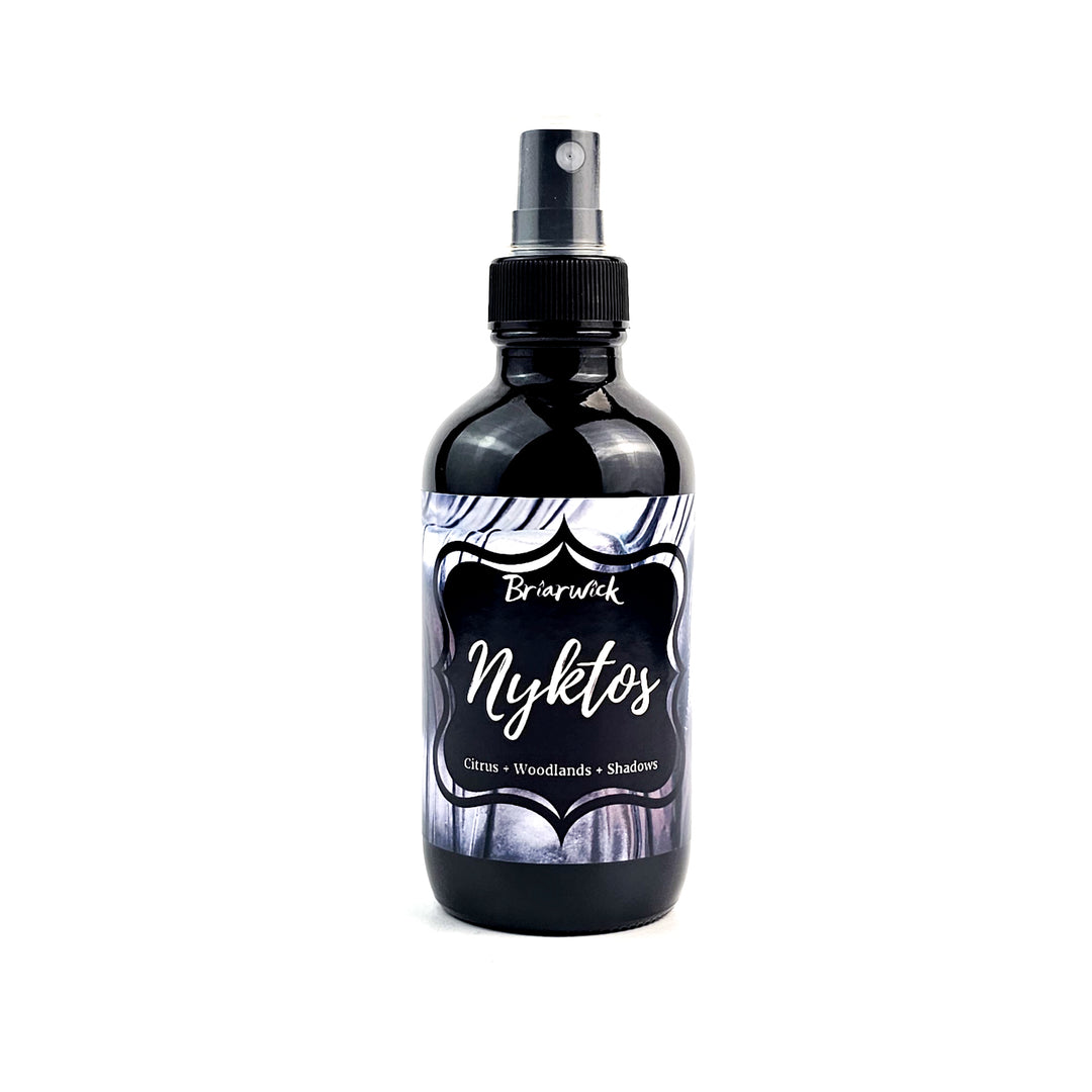 Nyktos 4oz Linen Spray with black & white textured design on a white background