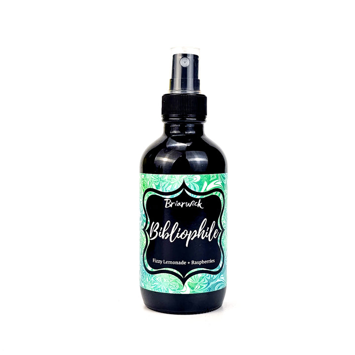 Bibliophile 4oz Linen Spray with green patterned design on a white background