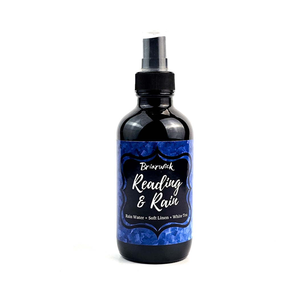 Reading & Rain 4oz Linen Spray with blue textured design on a white background