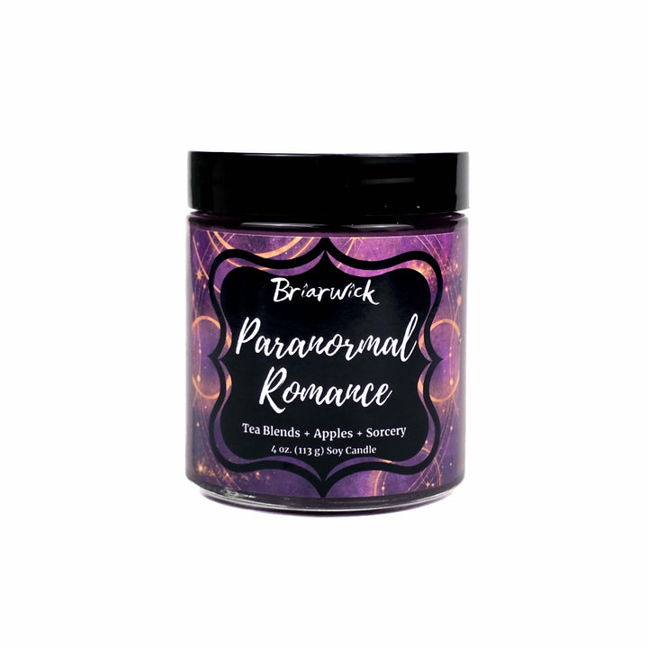 A 4oz jar of Briarwick Paranormal Romance soy candle with a black lid and a purple label featuring gothic text and gold accents, set against a plain white background.