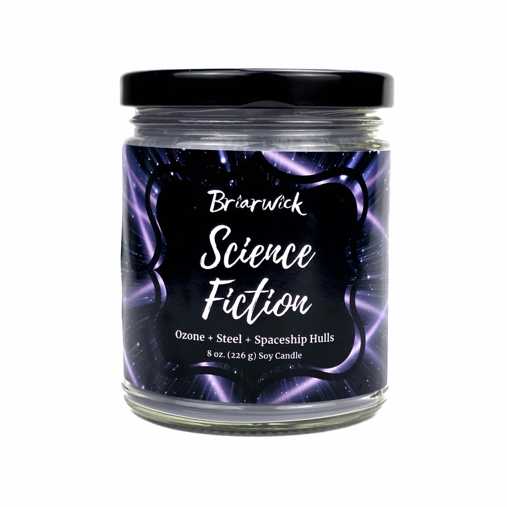 An 8 oz soy candle in a clear glass jar with a black lid and a dark purple and black label reading 'Briarwick Science Fiction'.