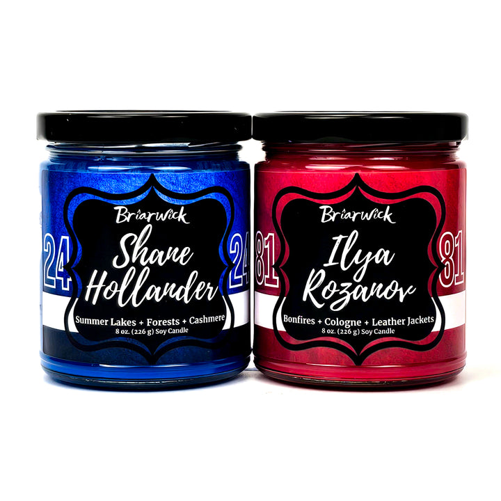 Blue Shane Hollander candle and red Ilya Rozanov candle on white background