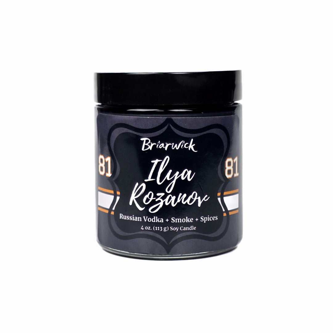 Candle jar with 'Briarwick Ilya Rozanov' branding on a white background