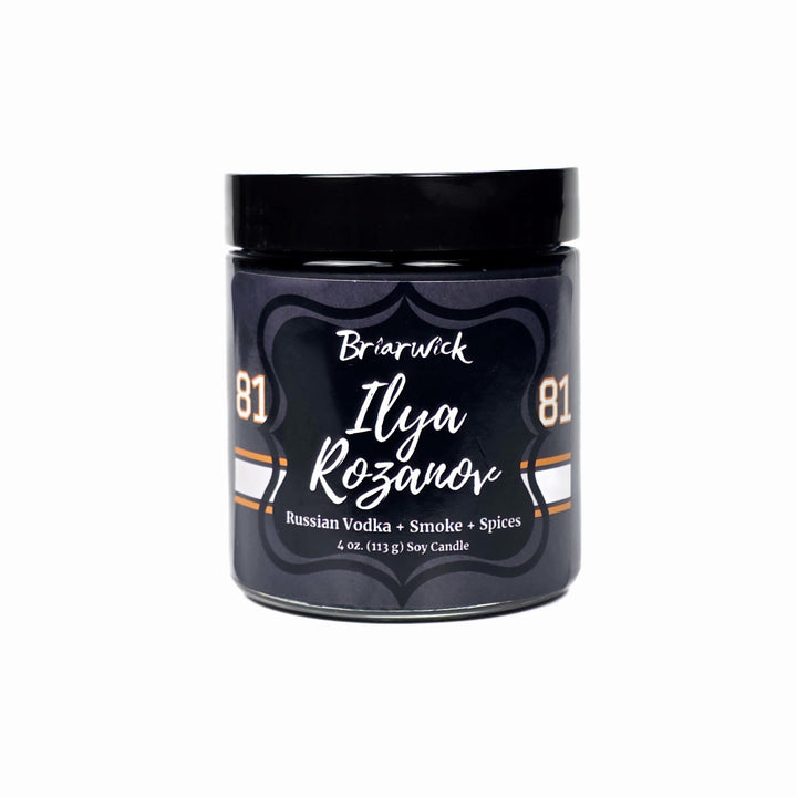 Candle jar with 'Briarwick Ilya Rozanov' branding on a white background