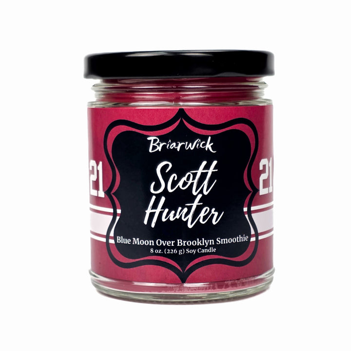 Candle jar with a red label featuring 'Briarwick Scott Hunter' on a white background