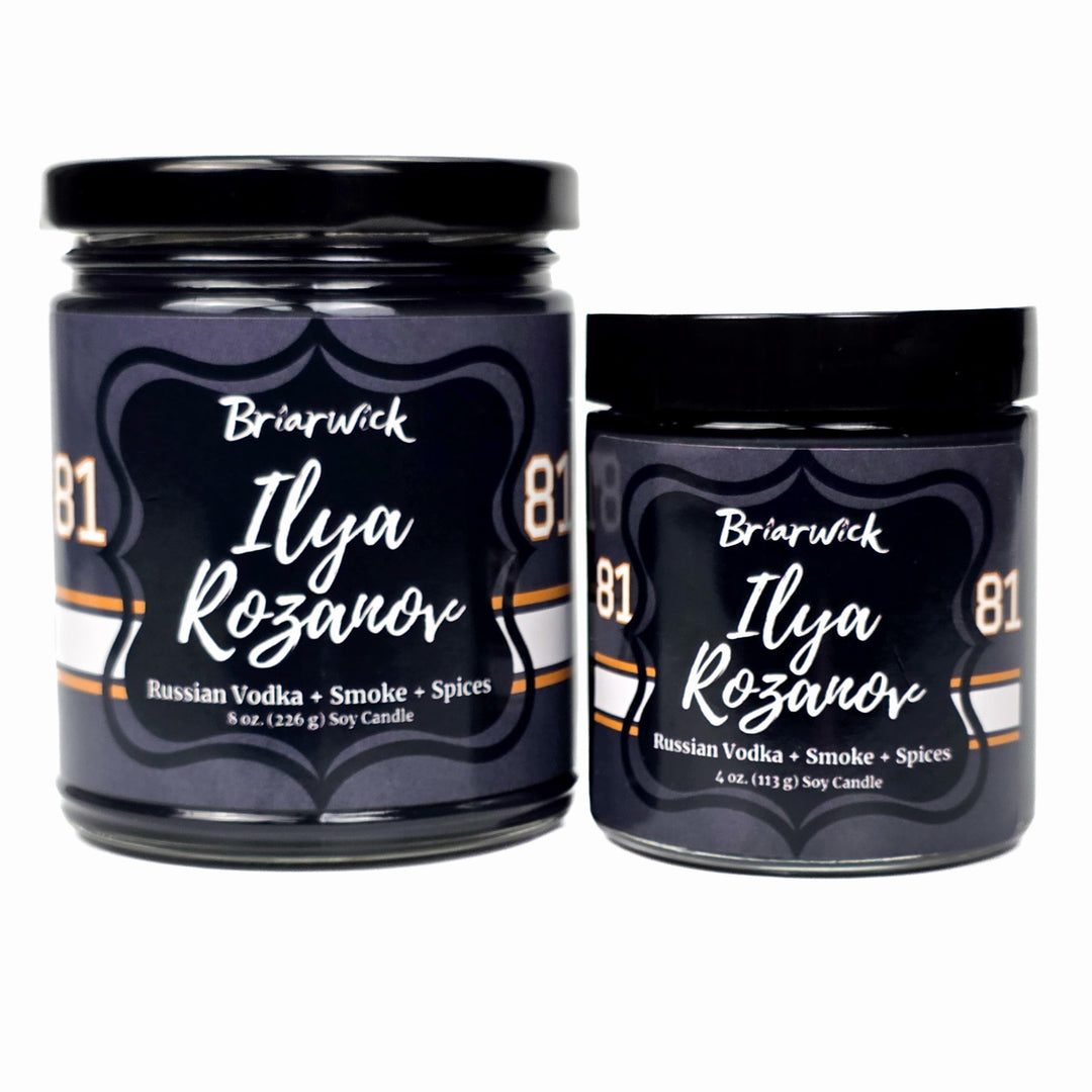 Two candles labeled 'Briarwick Ilya Rozanov' on a white background