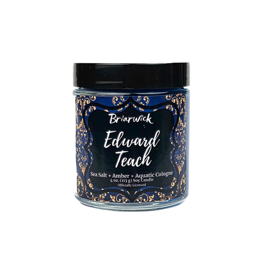 Candle jar with decorative label on a white background
