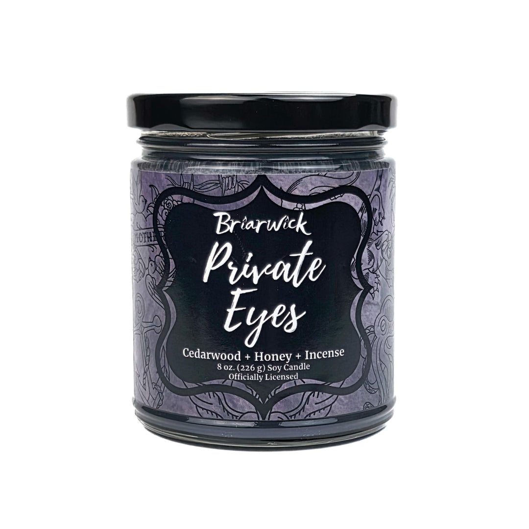 Candle jar labeled 'Private Eyes' by Briarwick on a white background