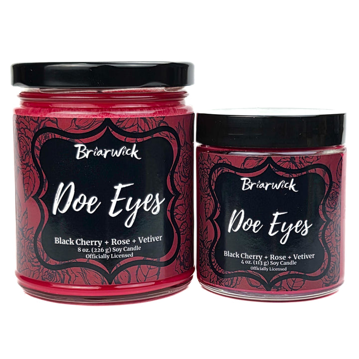 Two Briarwick Doe Eyes candles with black labels on a white background