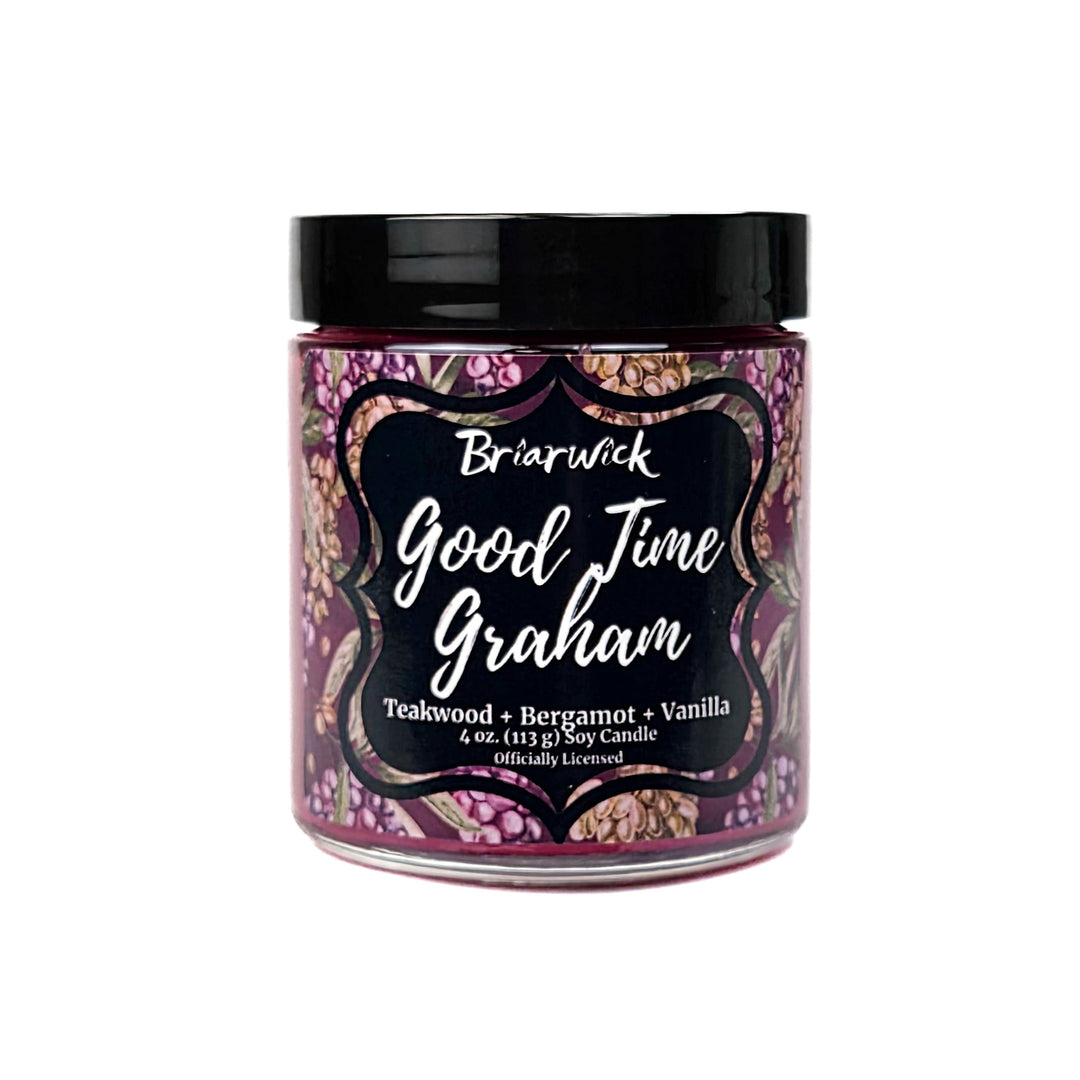 A plum Good Time Graham 4oz candle jar by Briarwick on a white background