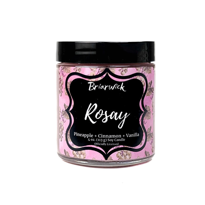 A pink Rosay 4oz candle jar by Briarwick on a white background