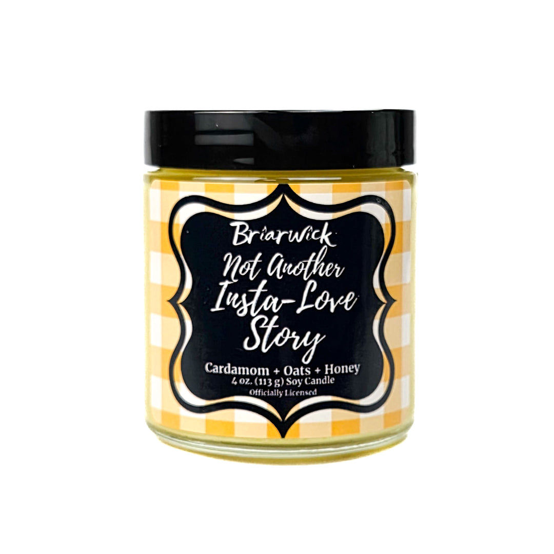 A yellow Not Another Insta Love Story 4 oz candle by Briarwick on a white background