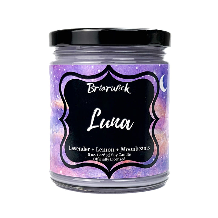 A purple Luna 8oz candle jar by Briarwick on a white background