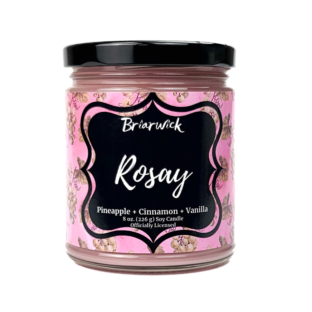 A pink Rosay 8oz candle jar by Briarwick on a white background