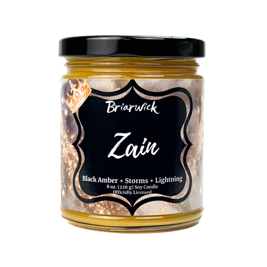 a gold Zain 8oz candle jar by Briarwick on a white background