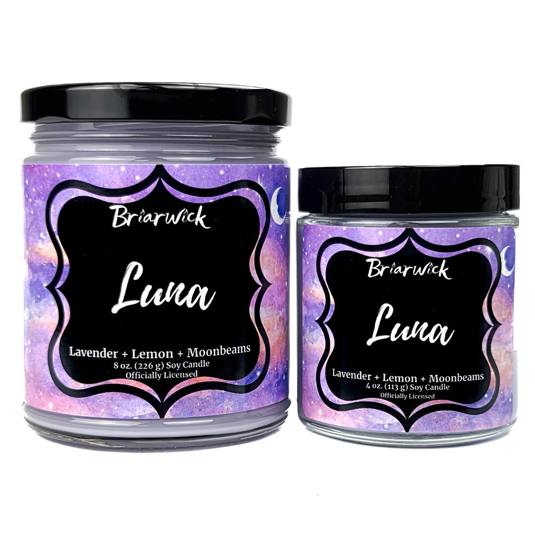 2 purple Luna candles by Briarwick on a white background