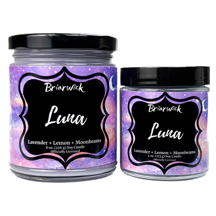 2 purple Luna candles by Briarwick on a white background