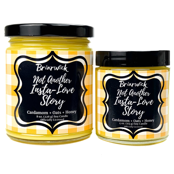 2 yellow Not Another Insta Love Story  candles on a white background