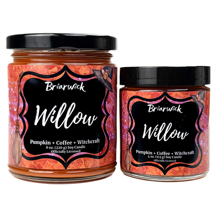 2 orange Willow candles by Briarwick on a white background