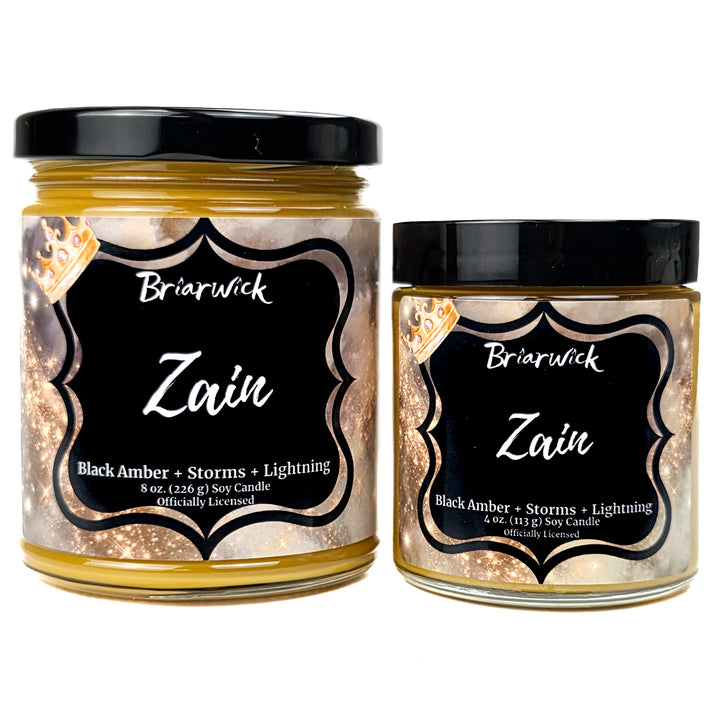 2 gold Zain candles by Briarwick on a white background