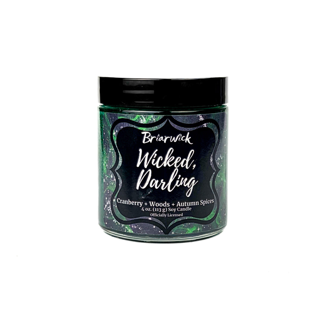 Briarwick 4oz soy candle in glass jar on white background. Green label has scent name Wicked, Darling