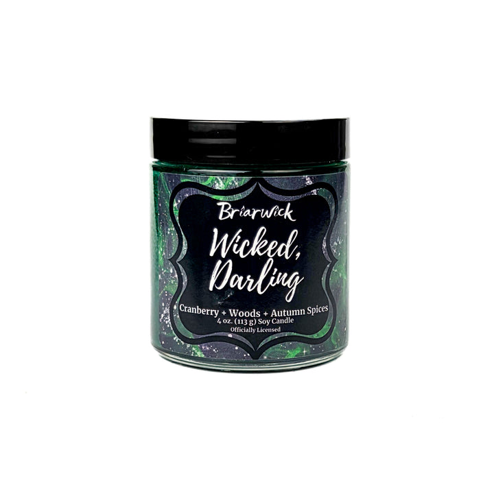 Briarwick 4oz soy candle in glass jar on white background. Green label has scent name Wicked, Darling