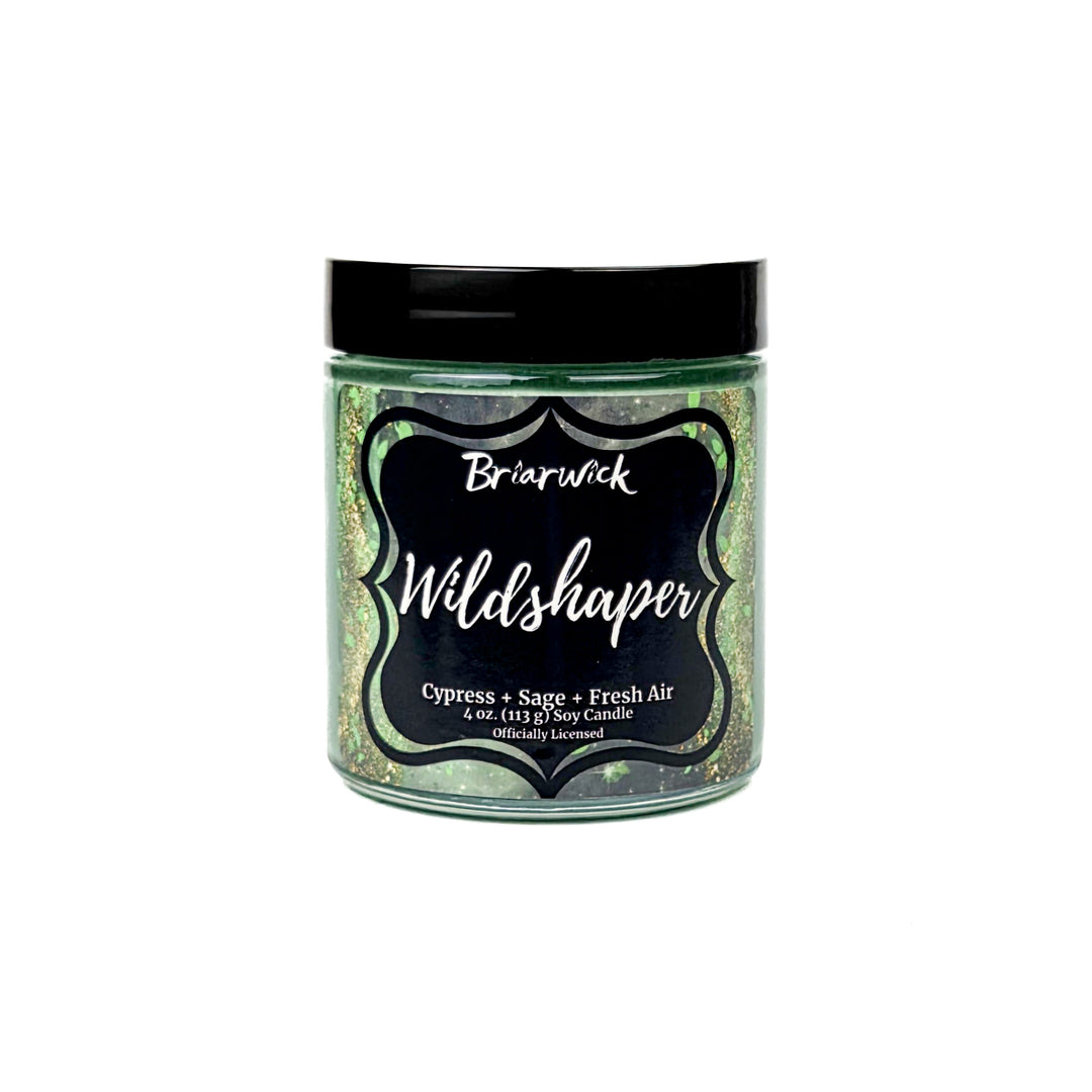 Briarwick 4oz soy candle in glass jar on a white background. Green label has scent name Wildshaper