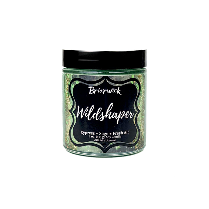 Briarwick 4oz soy candle in glass jar on a white background. Green label has scent name Wildshaper
