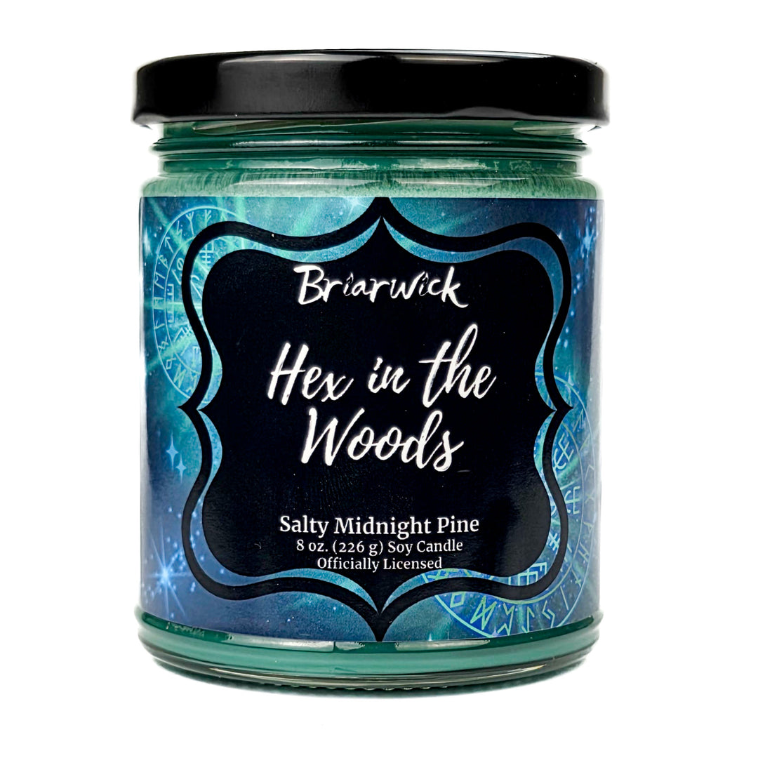 Briarwick 8oz soy candle in glass jar on white background.  Teal label has scent name Hex in the Woods