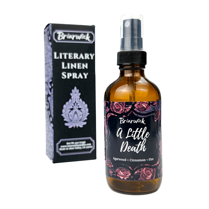 Brierwick Literary Linen Spray bottle and packaging on a white background. Amber bottle has red rose label with scent name A Little Death