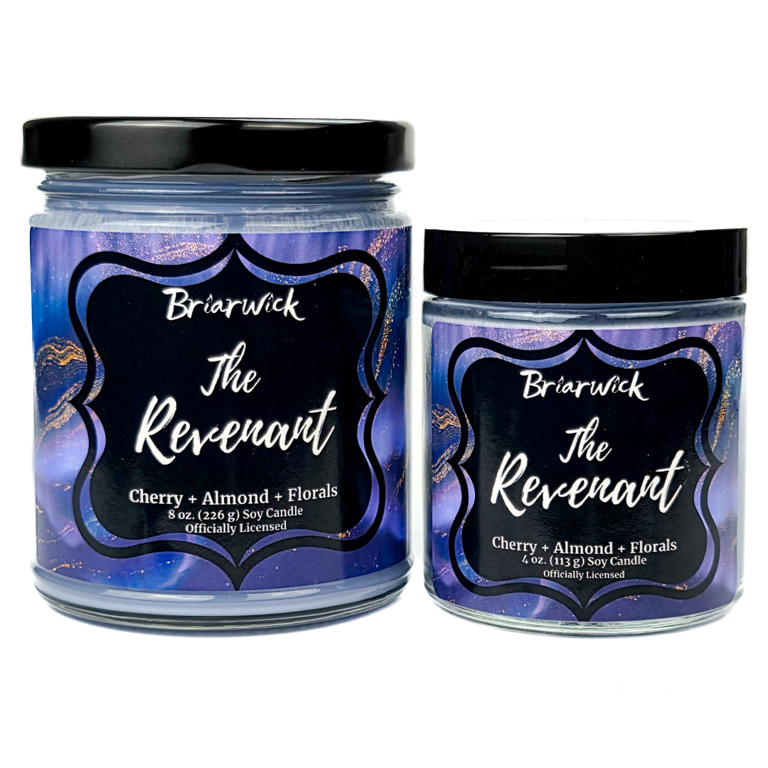 Two Briarwick 'The Revenant' candles with purple labels on a white background