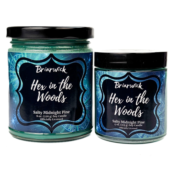 Two candles labeled 'Hex in the Woods' by Briarwick on a white background