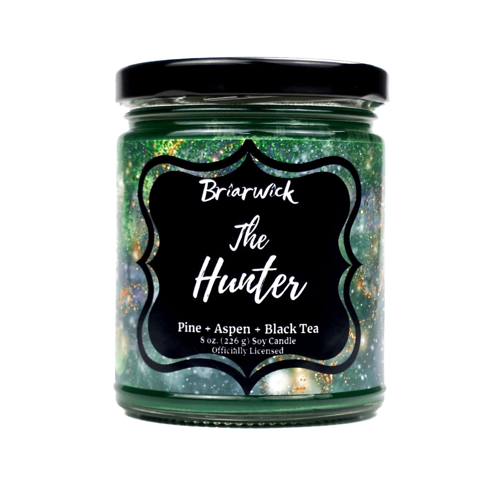 Candle jar labeled 'The Hunter' by Briarwick on a white background