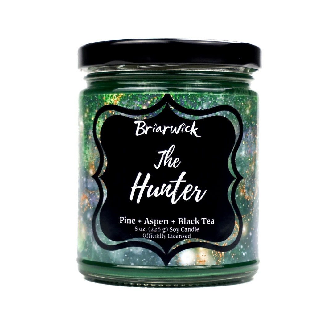 Candle jar labeled 'The Hunter' by Briarwick on a white background