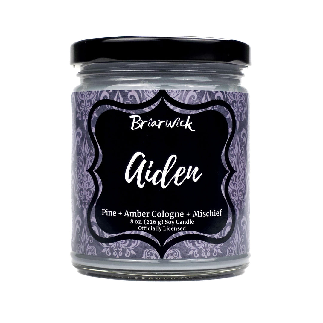 Candle jar with a decorative label on a white background