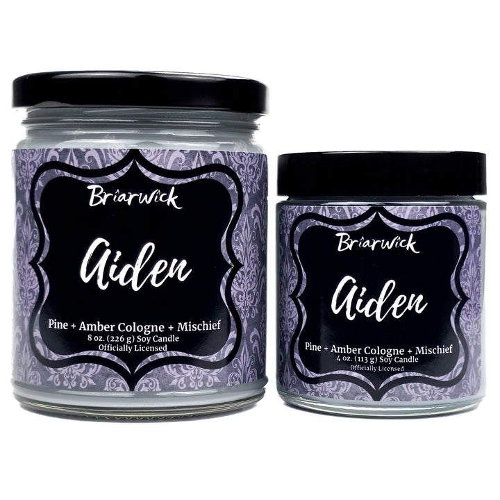 Two Briarwick Aiden candles with decorative labels on a white background