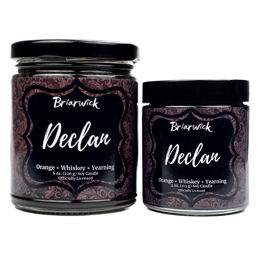Two Briarwick Declan candles with decorative labels on a white background