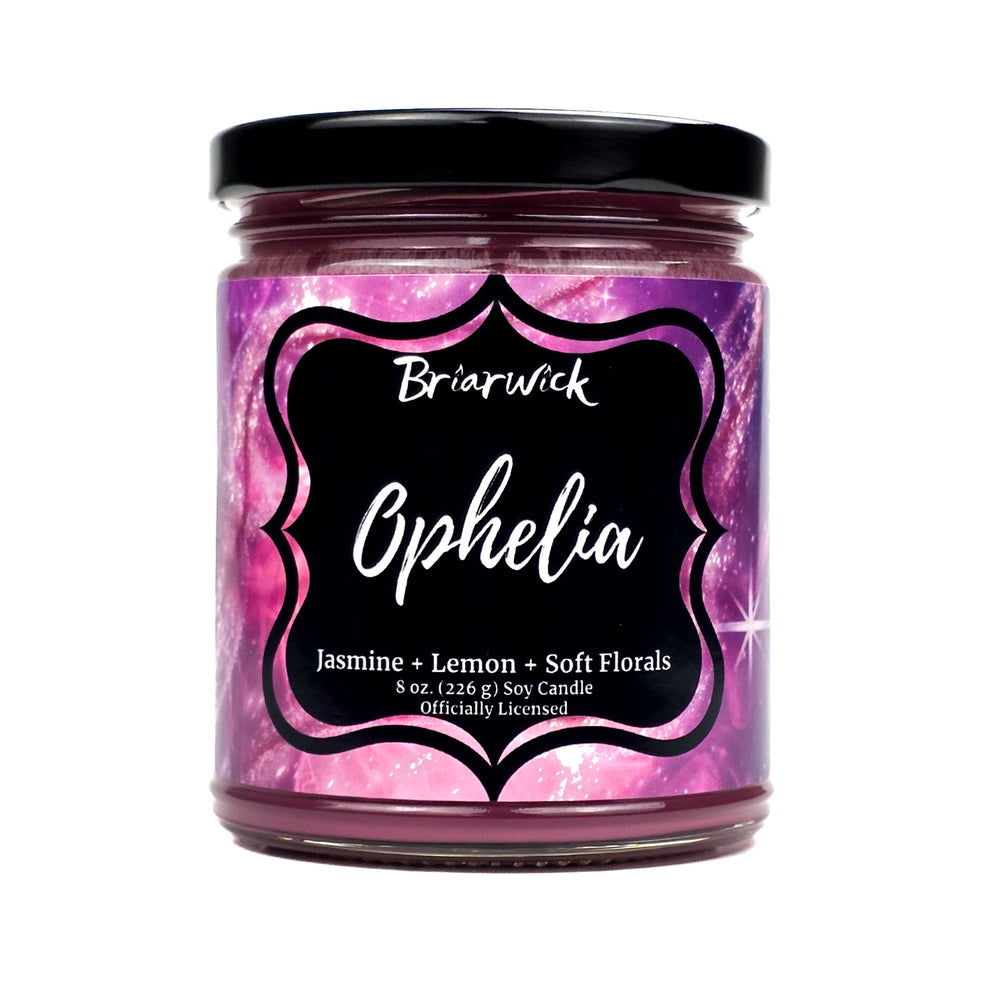 Jar of Briarwick Ophelia candle with pink and black label on a white background