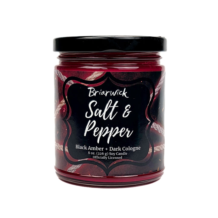 Jar of Briarwick Salt & Pepper candle with black lid on a white background