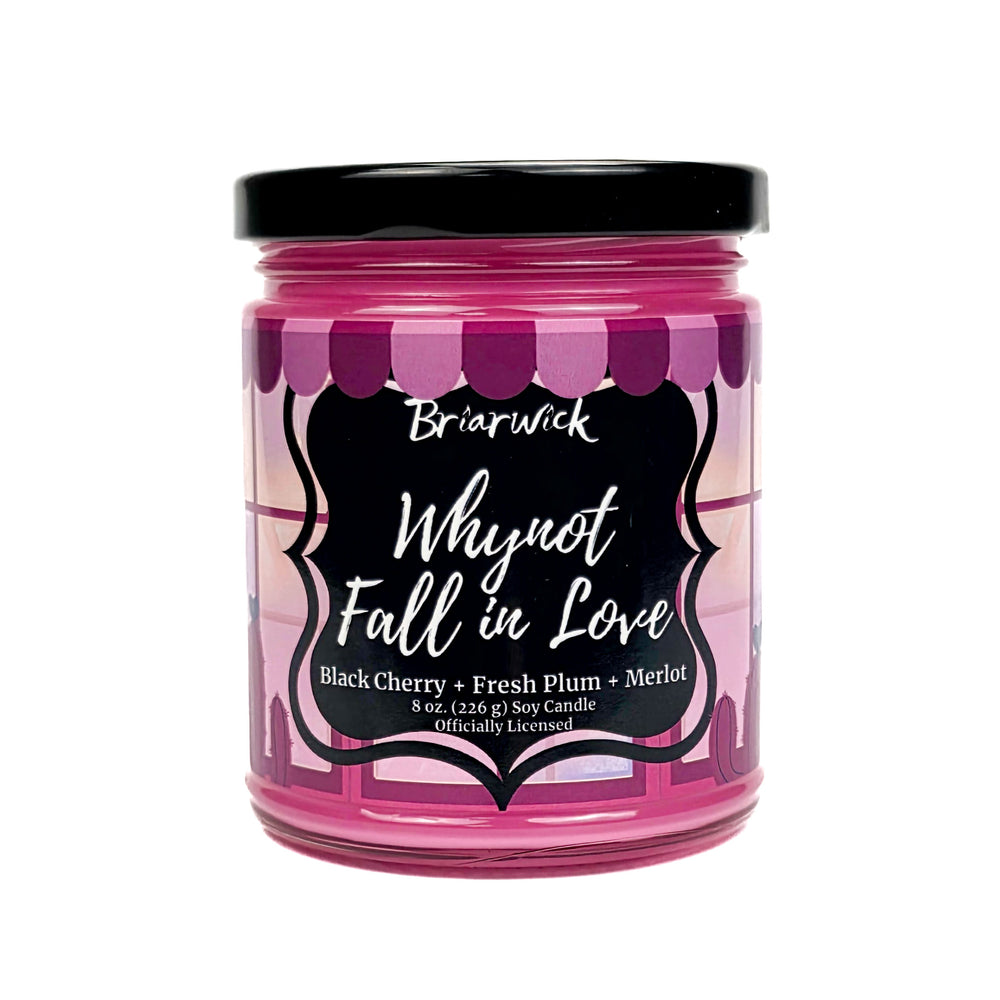 Pink candle jar called Whynot Fall In Love with black lid and label on a white background