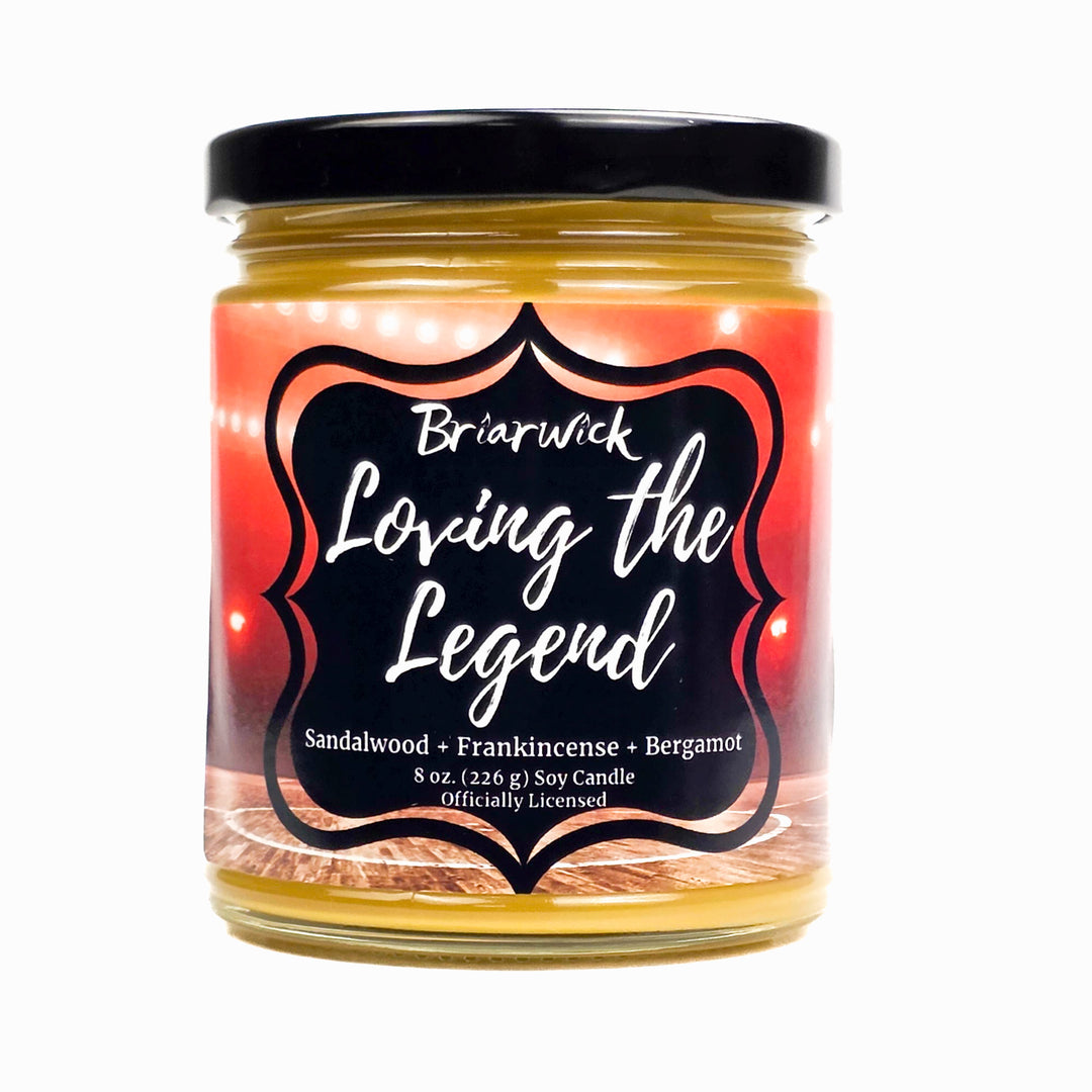 Jar of Briarwick candle with a black lid called 'Loving the Legend' on a white background