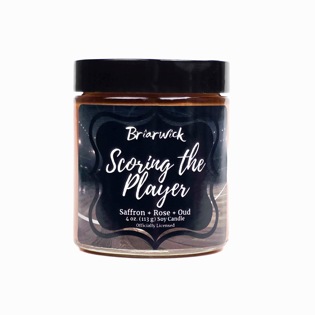 Candle jar labeled 'Scoring the Player' by Briarwick on a white background