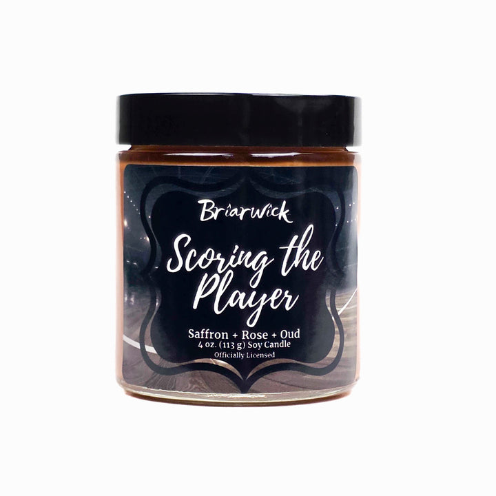 Candle jar labeled 'Scoring the Player' by Briarwick on a white background